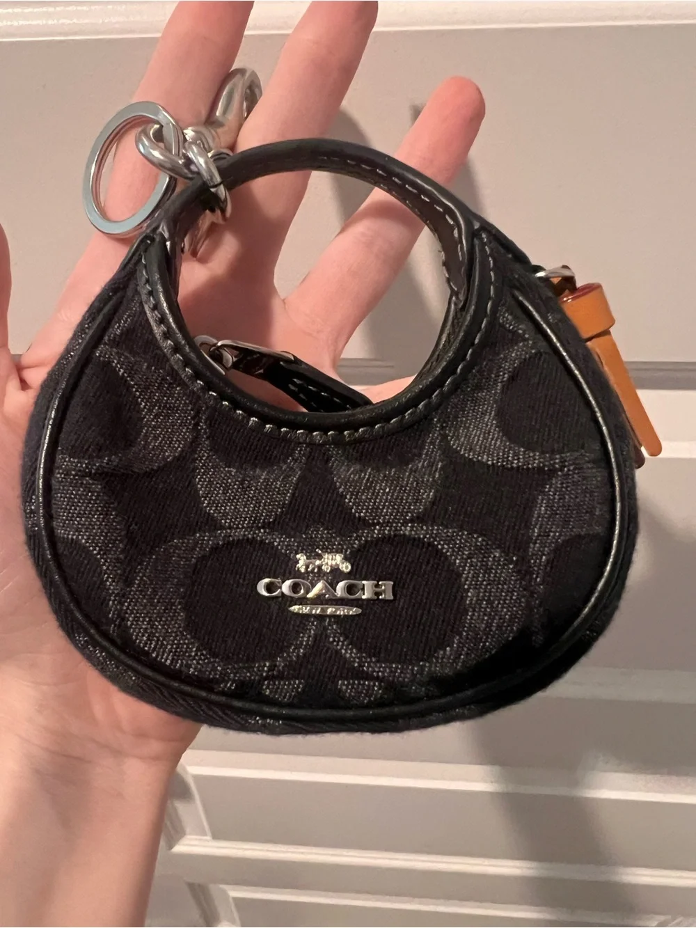 Coach Black Mini Signature Circle Bag Charm with Tan Tassel - Picture 10 of 11